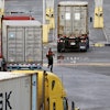 Companies that handle billions of dollars of cargo at West Coast seaports said they will hire far fewer workers this weekend, the latest escalation in a contract dispute with dockworkers that threatens to shut down a vital link in U.S.-Asia trade.