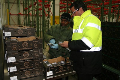 Blueberries from Peru are inspected by Crowley Fresh employees after being cold treated for pests.