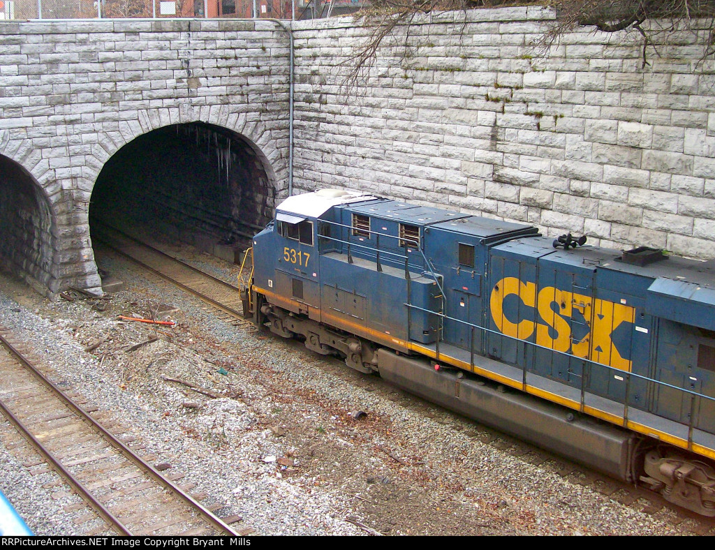 The tunnel, dug in the 1890s, was built to accommodate trains of that era. It does not have enough clearance to allow the passage of double-stacked freight containers, so cargo coming out of the port moves at half the pace that it can leave other facilities.