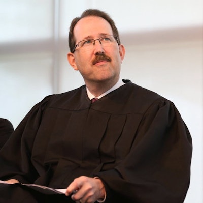 Attorney Janet Grumer, a partner and employment law specialist in law firm Davis Wright Tremaine, said the temporary injunction would likely be in place until the case is decided, and no decision is expected before the end of the year.