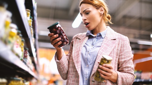 Getty Images 1015953866 Woman In Grocery Store