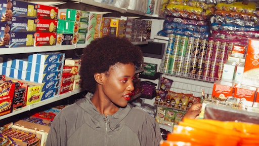 Ethnic Woman Choosing Products In Grocery Store 4177730