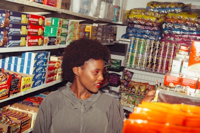 Ethnic Woman Choosing Products In Grocery Store 4177730
