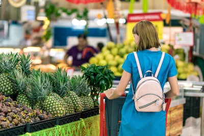 Woman Standing Beside Pineapple Fruits 2292919 (1)