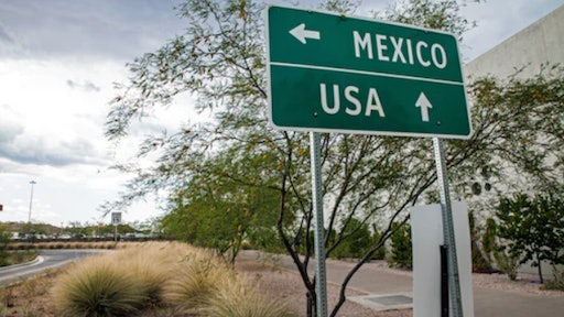 Mexico-U.S. border indication sign.