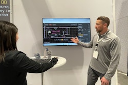 Editor-in-Chief Marina Mayer (left) demos the Yale Relay live at ProMat 2025, with instruction from Kyle Smart, sales manager, emerging technology, Yale Lift Truck Technologies.
