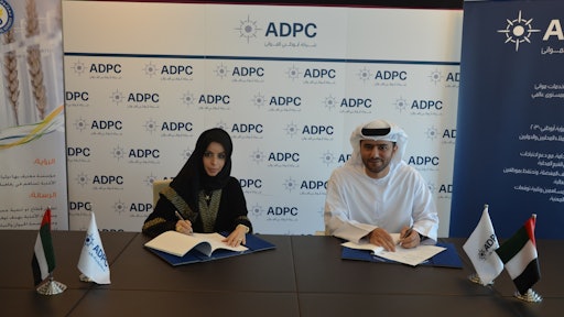 (From left) Dr. Mariam Hareb Sultan Al- Yousuf, Executive Director of Policy and Regulations Sector, and Captain Mohamed Al Shamisi, Executive Vice President of Ports Unit at ADPC during the signing.