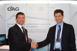 John DeBenedette, Managing Director of Worldwide Information Network (left) and Alv Hill, Executive Vice President of OAG Cargo (right), seal the deal at WCA Family Conference Week in Bangkok.