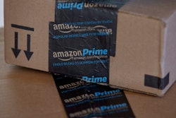This June 4, 2014 photo shows Amazon.com boxes in Phoenix. Amazon reports quarterly financial results on Thursday, July 24, 2014. (AP Photo/Ross D. Franklin)