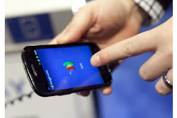 FILE - In this Jan. 17, 2012 file photo, a person tries a smartphone loaded with Google Wallet at the National Retail Federation in New York. Apple Pay has gotten a lot of attention in recent weeks, but there are lots of other mobile-payment systems. Google Wallet uses a similar wireless technology called NFC, or near-field communication. (AP Photo/Mark Lennihan, File)