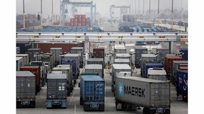 FILE - The ports of Los Angeles (pictured) and Long Beach, which form the largest port complex in the Western Hemisphere, reported a 37 percent jump in container imports from a year earlier, when both ports slowed to a crawl amid protracted labor negotiations. (AP Photo/Nick Ut, File)