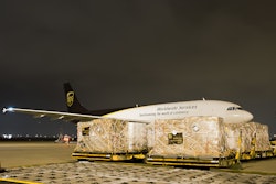 A UPS plane with nearly 100,000 pounds of American Red Cross relief supplies prepares to take off from Dallas/Fort Worth International.