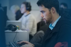 Guy on Computer 562e339fea77e