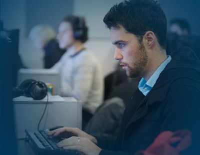 Guy on Computer 562e339fea77e