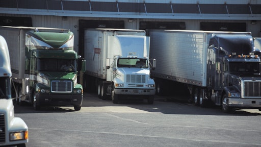 Truckers waiting at dock 5789171f194d1