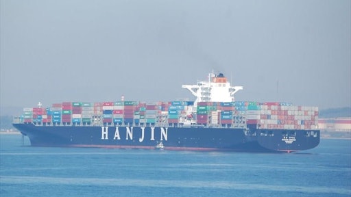 Truckers began moving freight from the Hanjin Greece (above), one of roughly a dozen of the company's ships destined for the U.S. West Coast, out of the port of Long Beach Monday.
