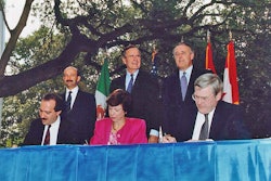 Back row, left to right: Mexican President Carlos Salinas de Gortari, U.S. President George H. W. Bush, and Canadian Prime Minister Brian Mulroney, at the initialing of the draft North American Free Trade Agreement in October 1992. In front are Mexican Secretary of Commerce and Industrial Development Jaime Serra Puche, United States Trade Representative Carla Hills, and Canadian Minister of International Trade Michael Wilson.