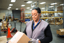 SRNS employee Sharon Chavous receives a shipment at the receiving inspection warehouse. SRNS SCM implemented a lean management system that resulted in $2.4 million in cost savings annually.
