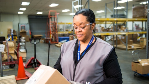SRNS employee Sharon Chavous receives a shipment at the receiving inspection warehouse. SRNS SCM implemented a lean management system that resulted in $2.4 million in cost savings annually.
