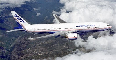 Boeing 777 above clouds crop 58a72553a6c6f