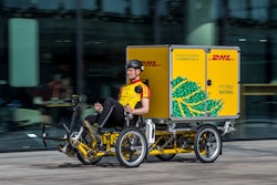 The City Hub is a customized trailer that can carry up to four containers for the DHL Cubicycle, a customized cargo bicycle, which can carry a container with a load of up to 125 kg.