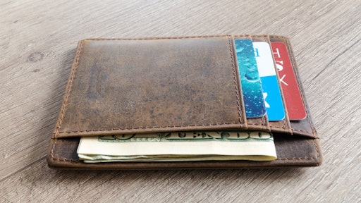 Brown Leather Wallet And Us Dollar Banknote 915915
