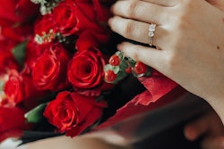 Person Holding Bouquet Of Red Roses 1315921