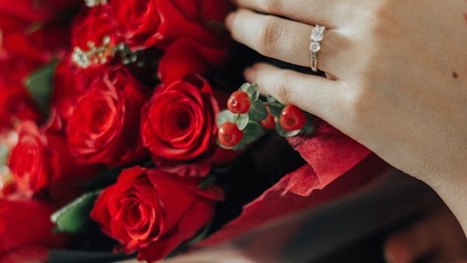 Person Holding Bouquet Of Red Roses 1315921