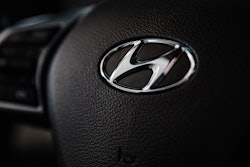 Shallow Focus Photography Of Hyundai Emblem 1236789