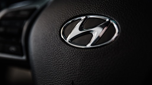 Shallow Focus Photography Of Hyundai Emblem 1236789