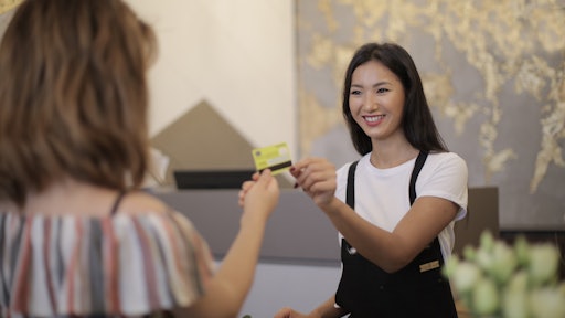 Woman Paying With Credit Card 3933649
