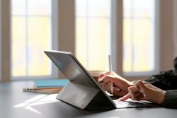 Person Using Tablet Computer With Keyboard 3815615