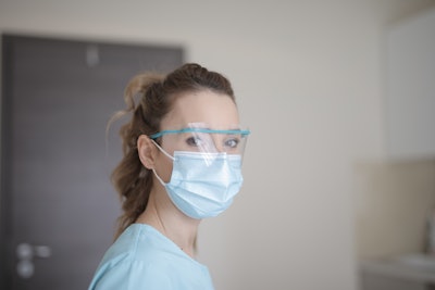 Woman In Blue Shirt Wearing Face Mask 3881247