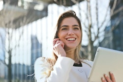 Woman In White Blazer Holding Tablet Computer 789822