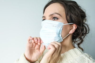 Woman In White Face Mask 3873193