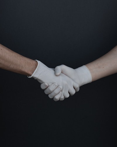 People Shaking Hands In Latex Gloves 3959482