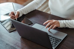 Crop Faceless Female Entrepreneur Doing Multitasking Work On 4474033