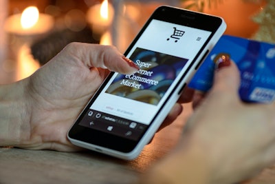 Person Using Black And White Smartphone And Holding Blue 230544
