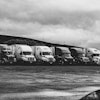 Parked Trucks Under Clouds 2348359