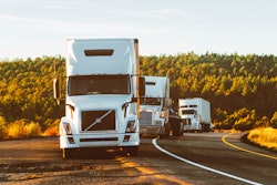 White Volvo Semi Truck On Side Of Road 2199293