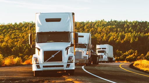 White Volvo Semi Truck On Side Of Road 2199293