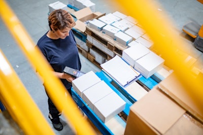 Woman In Supply Chain Facility E1578769986358