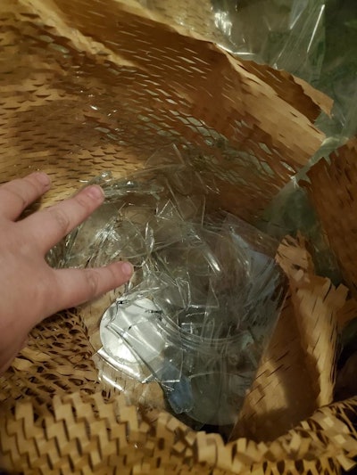 The jar arrived completely smashed in the most unusual netting packaging I have ever seen. It was this shipment that helped create 'Unboxing the Last Mile.'