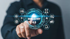 Professional holding holographic Industry 4.0 interface with connected technology icons