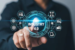 Professional holding holographic Industry 4.0 interface with connected technology icons