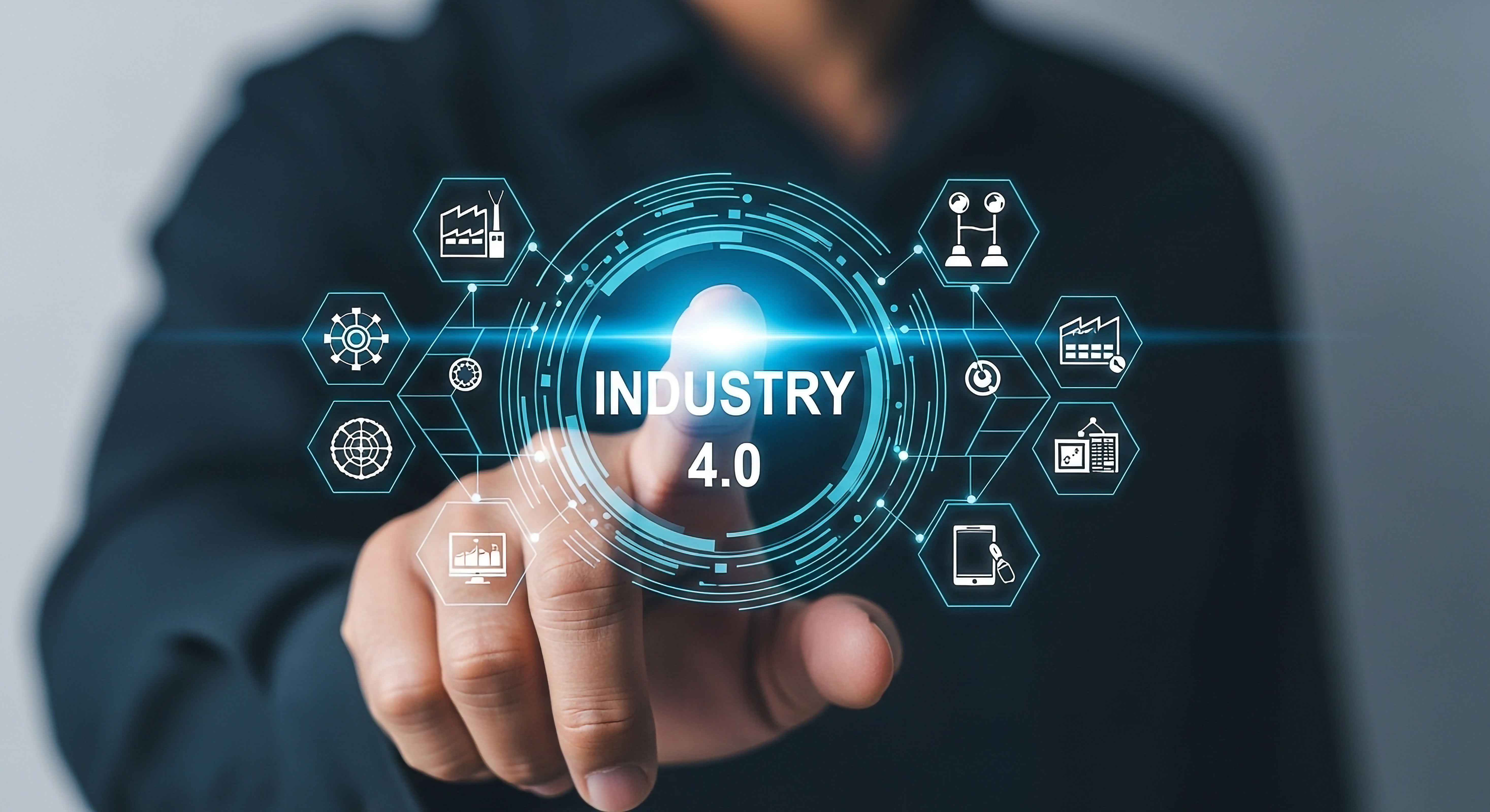 Businessman touching holographic Industry 4.0 interface with connected technology icons