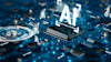 Glowing AI text on microchip with circuit board and digital network connections in blue neon theme