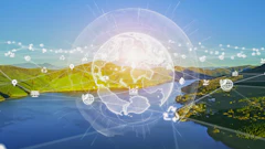 Digital globe with network nodes overlaid on scenic landscape with mountains, water, and green terrain representing global connectivity
