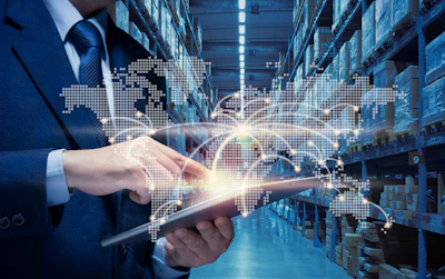 Businessman holding tablet in warehouse with holographic world map and global network visualization overlay