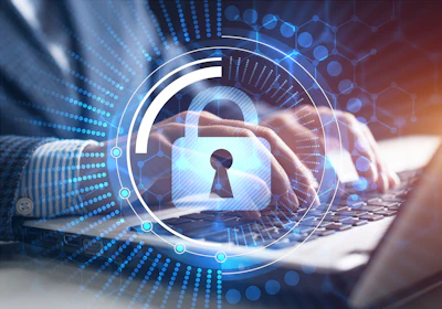 Digital security concept showing glowing padlock with keyhole overlay on laptop keyboard with data visualization elements